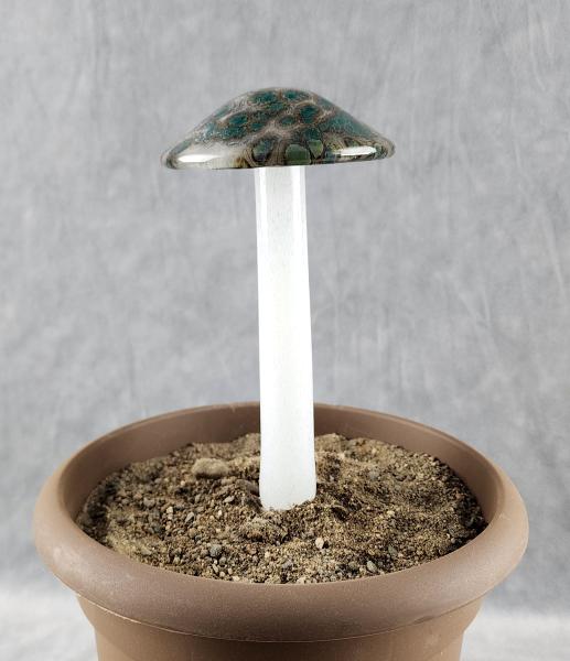 #04122436 GLOW IN THE DARK mushroom on glass stake 7''H x 4''W $80