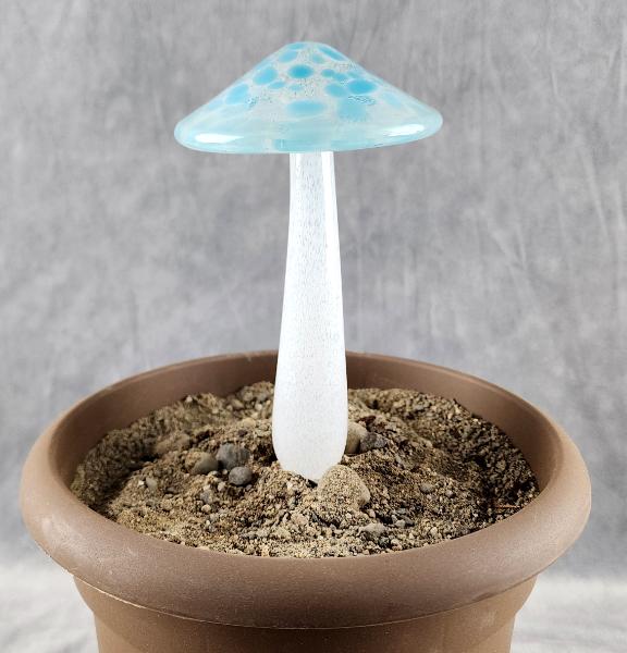 #04122418 GLOW IN THE DARK mushroom on glass stake 7''H x 4''W $80